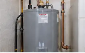 Plumber inspecting copper connections on a residential water heater